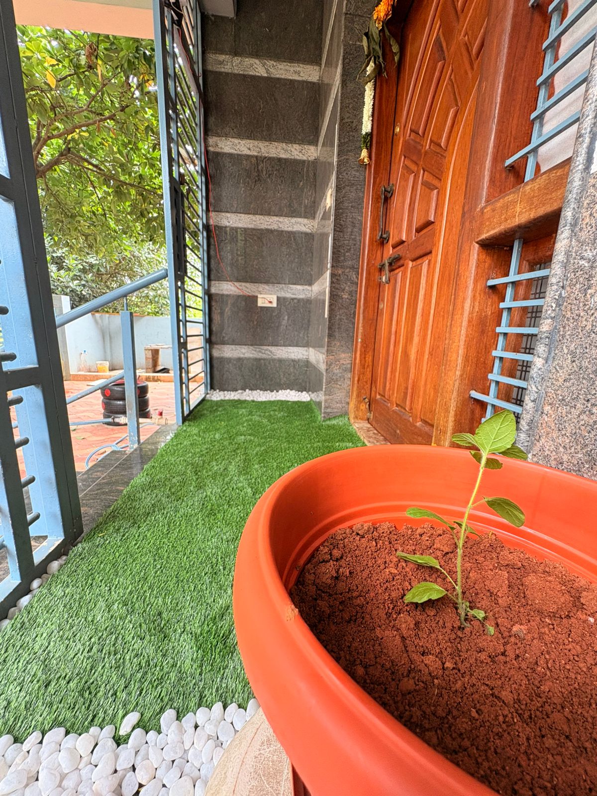 Close-up texture of 25MM premium artificial grass with double layer stitching